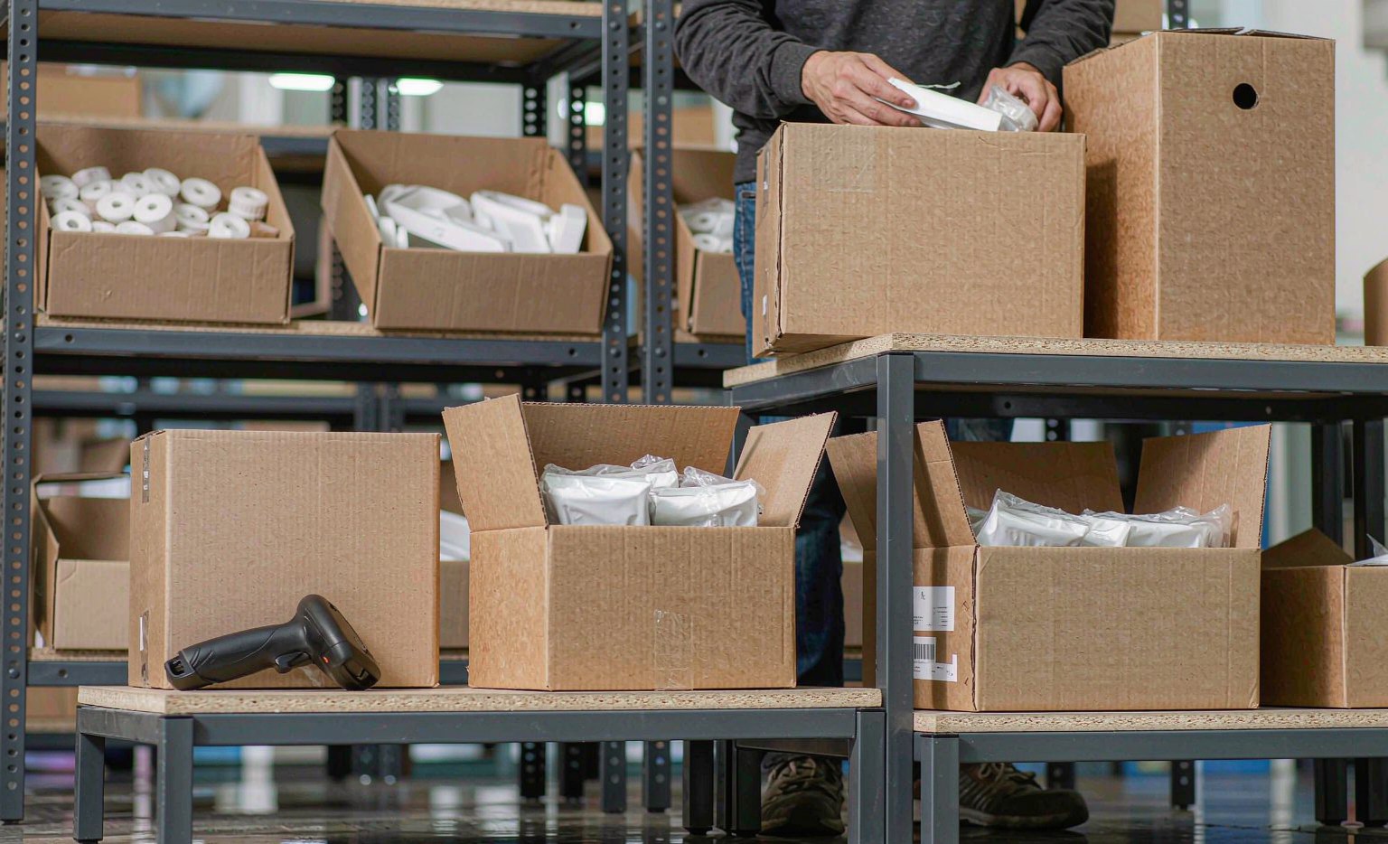 Fulfillment warehouse shelves storing boxed inventory