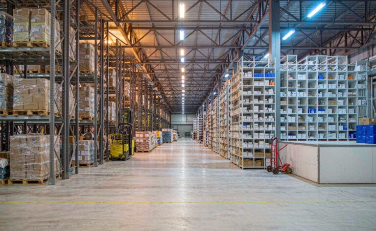 Regional fulfillment warehouse with shelving and parcel staging areas